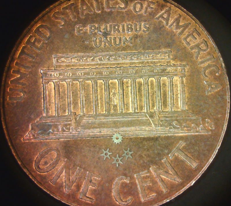 Stainless-Steel-gears-on-back-of-penny